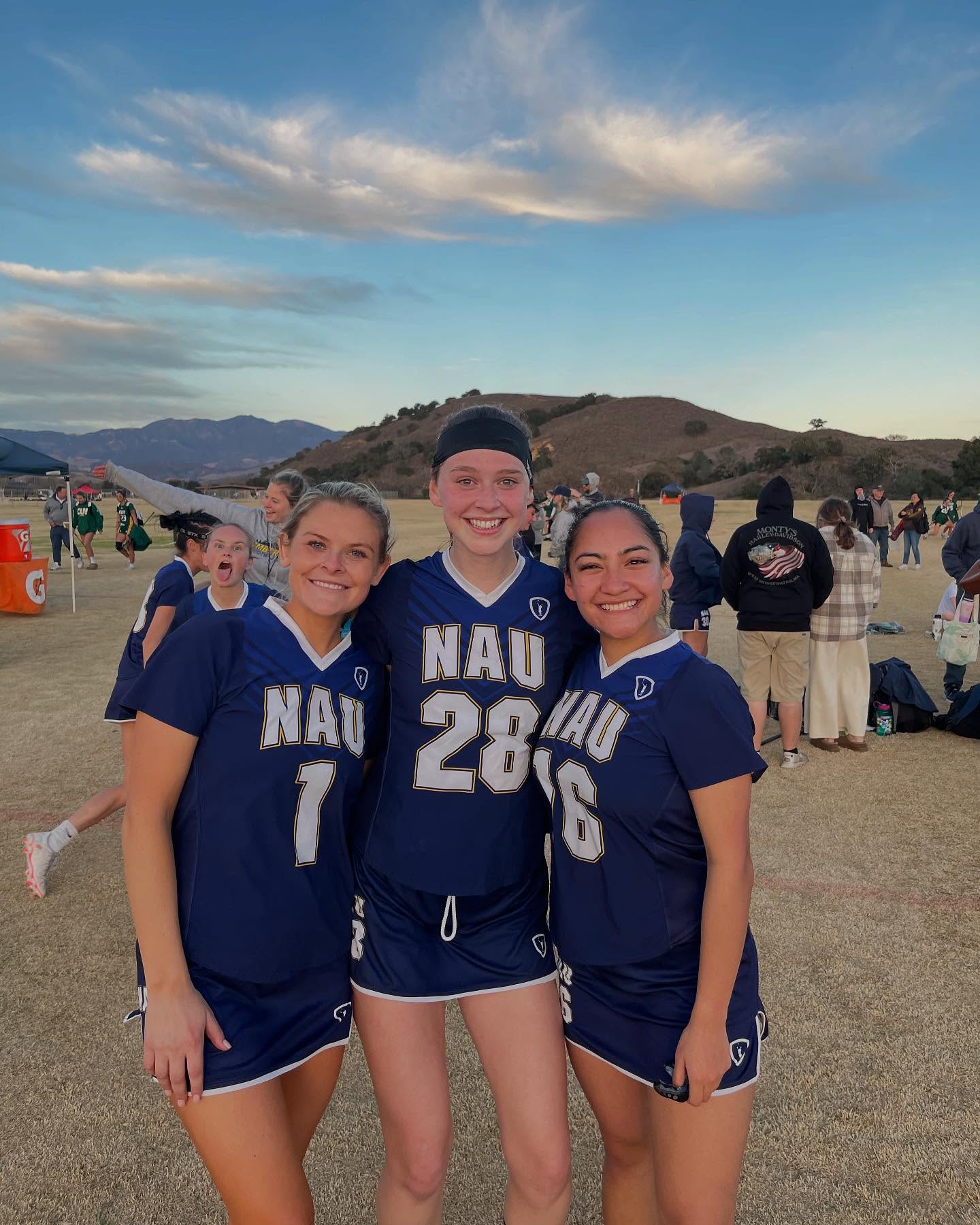 Three Northern Arizona University Women’s Lacrosse Club teammates smiling at the 2025 Santa Barbara Shootout
