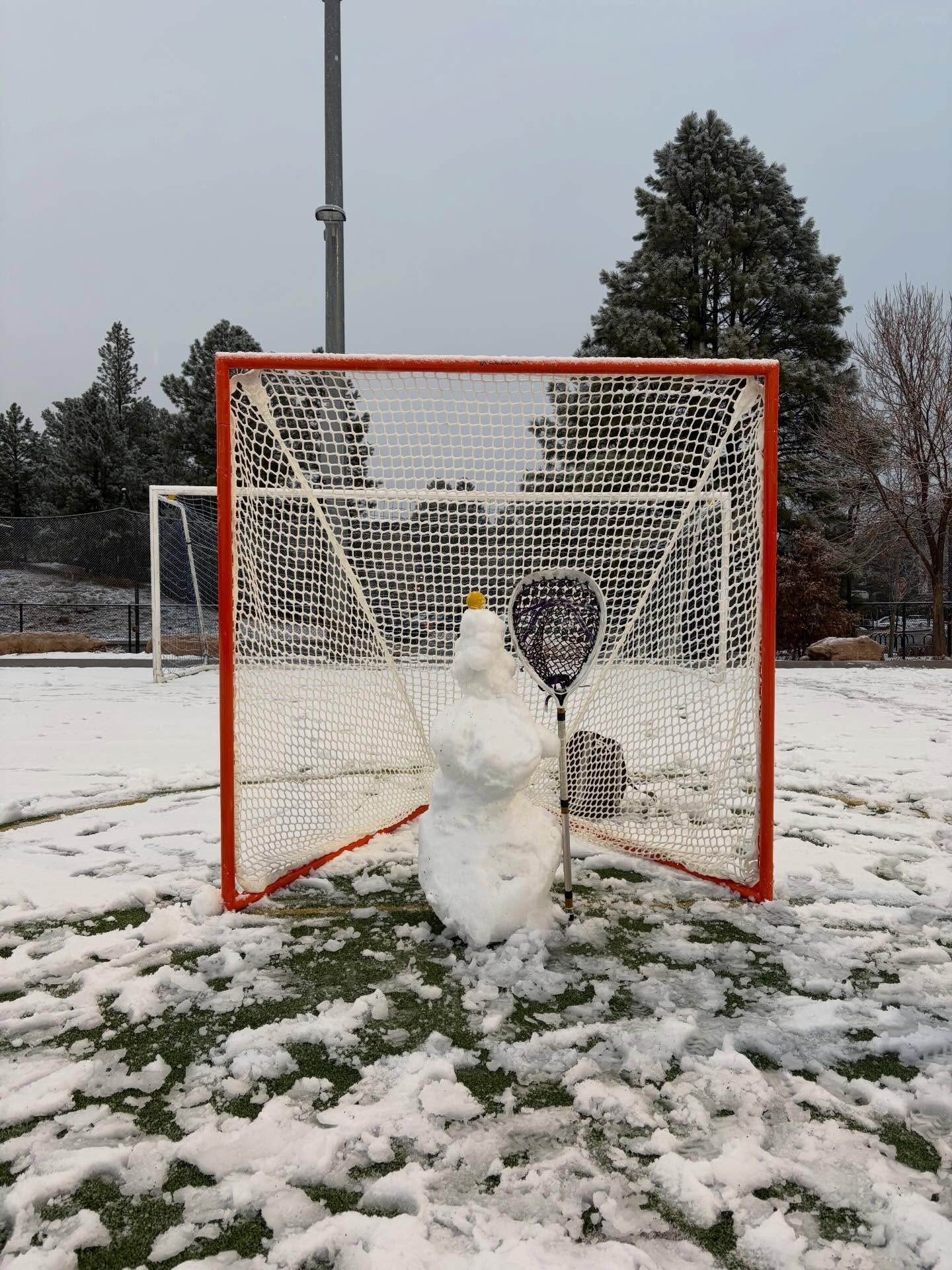 Snowman goalie in a Northern Arizona University Women’s Lacrosse Club net after the first Flagstaff snow